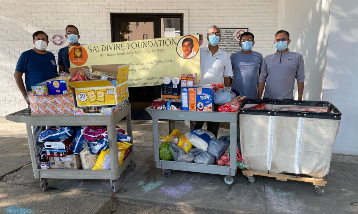 Volunteers with loaded carts