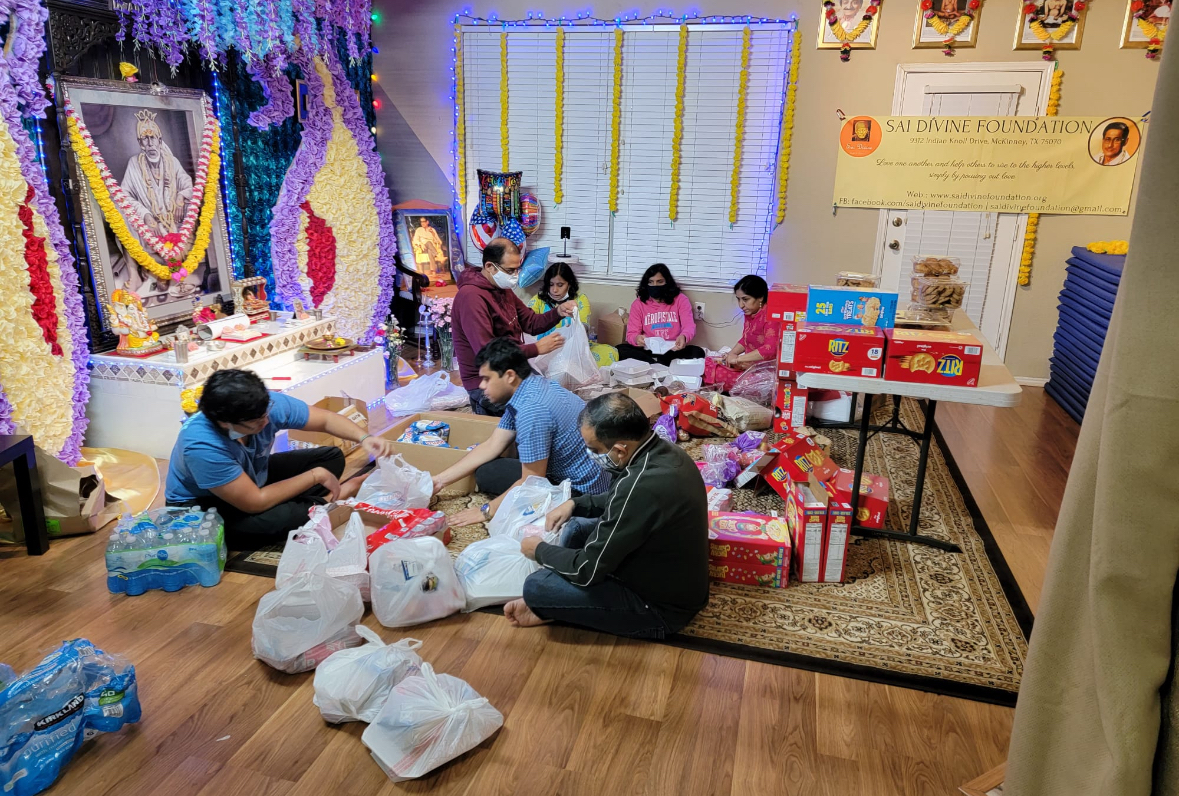 Charity volunteers packaging supplies